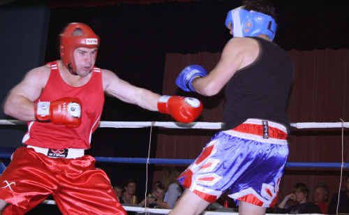 Steve Parry (red) from Fighters Inc gym in Emerald takes on Lewis Robinson from Sarina. Steve Parry (red) from Fighters Inc gym in Emerald takes on Lewis Robinson from Sarina.